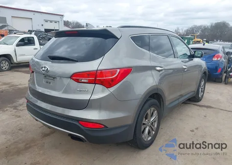 2014 Hyundai Santa Fe Sport 2.4L z USA, uszkodzony, nr VIN 5XYZU3LB9EG158638